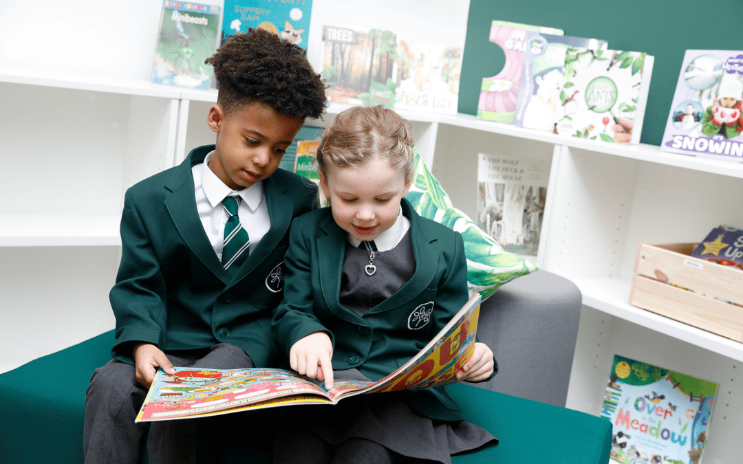 Woodford Primary School pupils reading together in the school library.