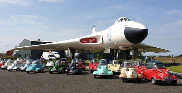 Image of plane and cars from the Avro Museum